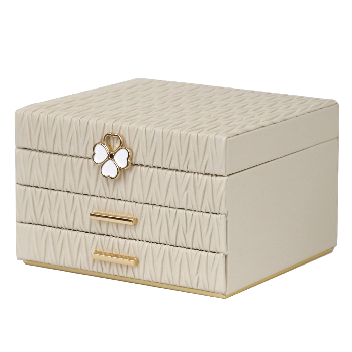 Beige jewelry box with butterfly design on a white background