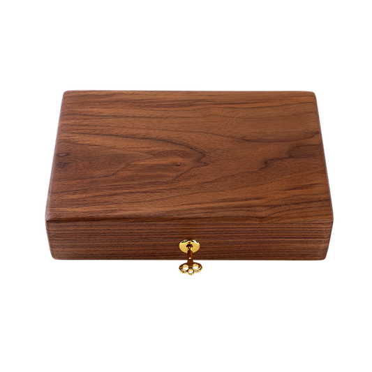 Wooden box with a gold clasp on a white background