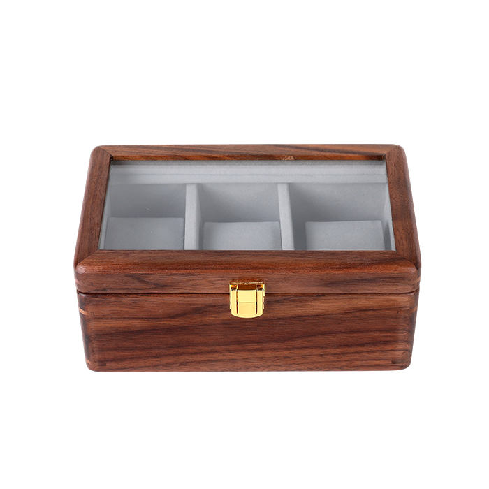 Wooden jewelry box with glass top on a white background