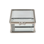 Glass jewelry box with silver decorative bow on a white background