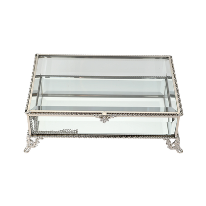 Decorative glass box with silver metal frame on a white background
