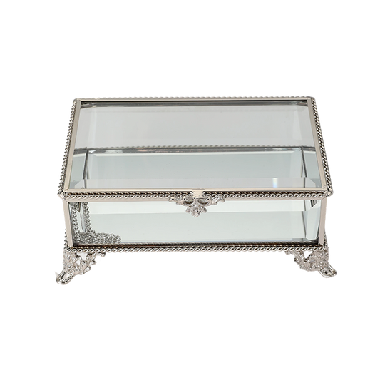 Decorative glass box with silver metal frame on a white background