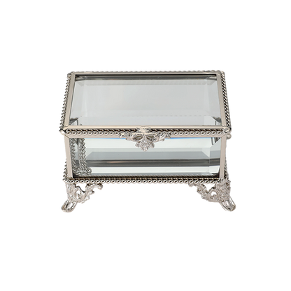 Silver jewelry box with glass top on a white background