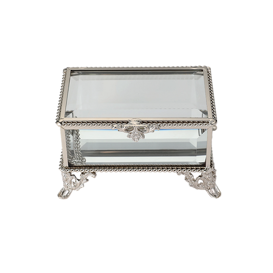 Silver jewelry box with glass top on a white background