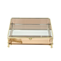 Decorative glass box with gold accents on a white background