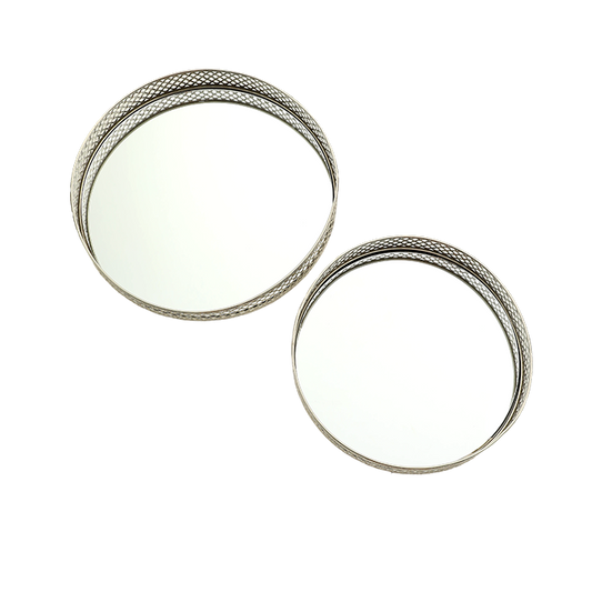 Two silver rings with textured band design on a white background