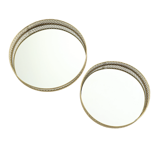 Two round metallic coasters with textured edges on a white background