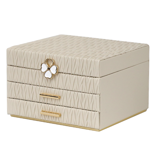 Beige jewelry box with butterfly design on a white background