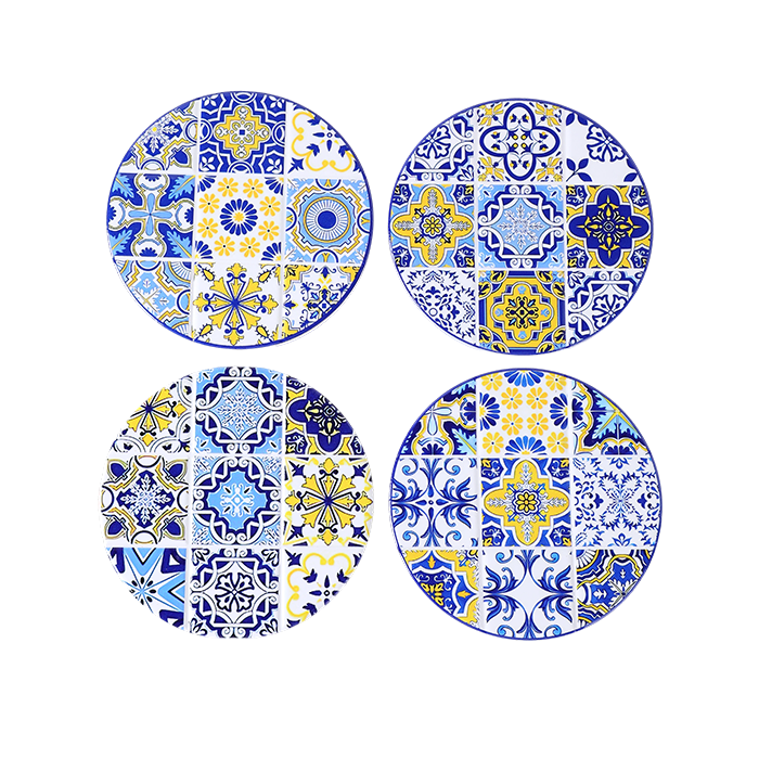 Set of four round ceramic plates with blue and yellow geometric patterns on a white background