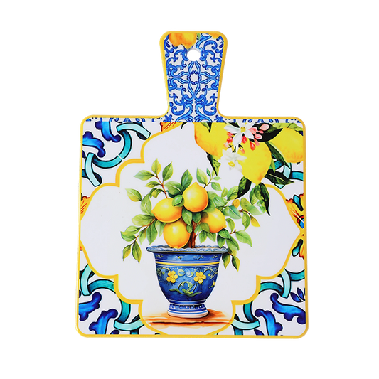Decorative cutting board with floral and fruit design on a white background
