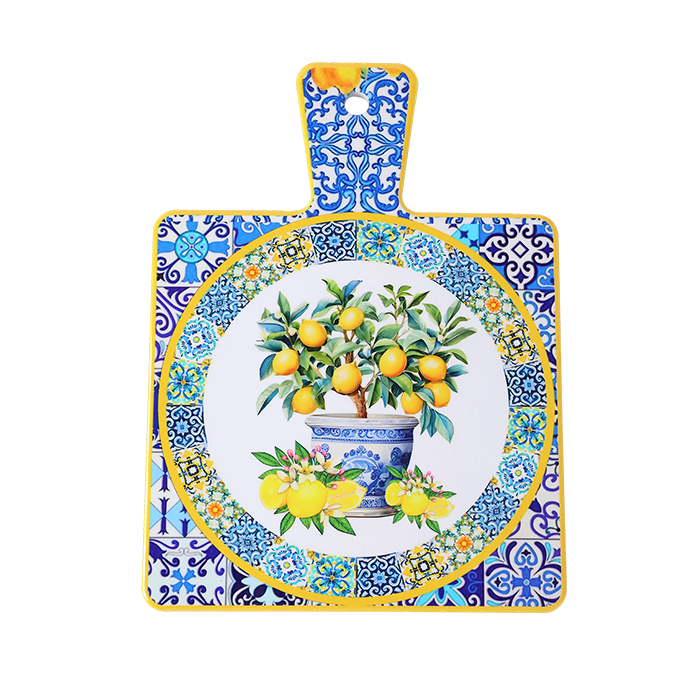 Decorative cutting board with lemon tree design and blue patterned border on a white background