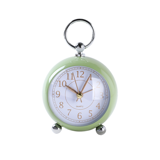 Green clock with a white face on a white background