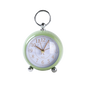 Green clock with a white face on a white background