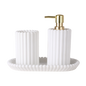 White textured soap dish with gold pump on a white background