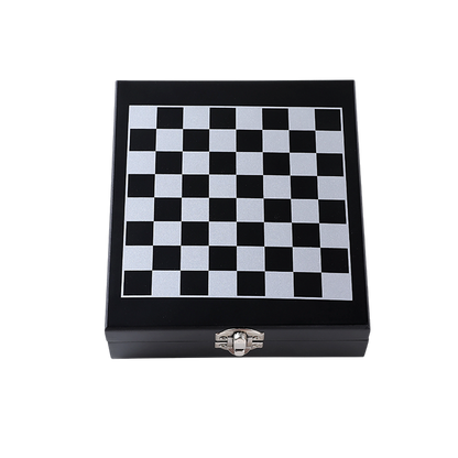Checkered black and white board inside a wooden box on a white background