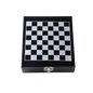 Checkered black and white board inside a wooden box on a white background